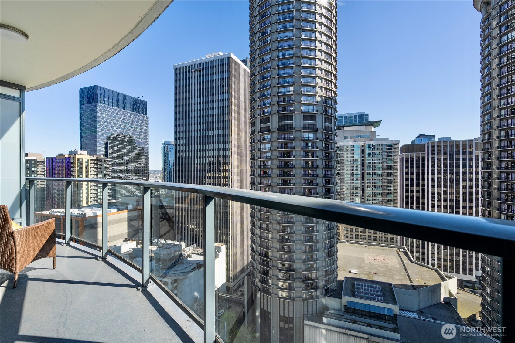 1920 4th Avenue, Unit 1809 Seattle, WA 98101 - Photo 18 of 30 a view of balcony with wooden floor and fence
