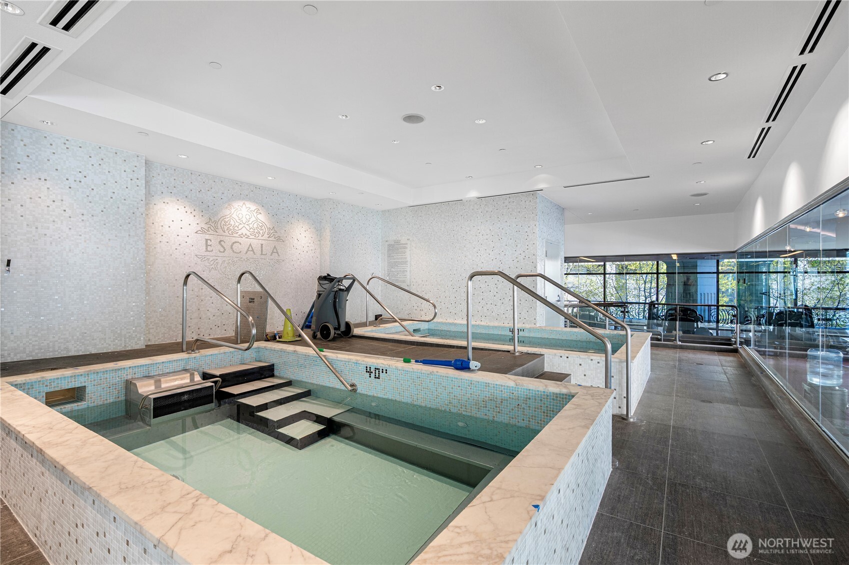 1920 4th Avenue, Unit 1809 Seattle, WA 98101 - Photo 19 of 30 a view of a room with gym equipment