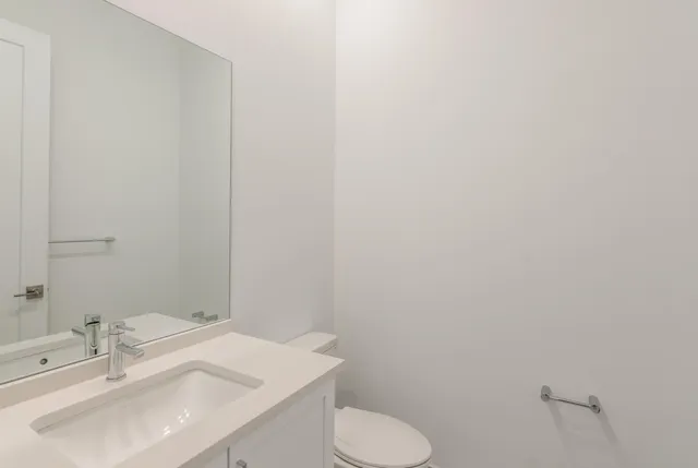 a bathroom with a sink and a toilet