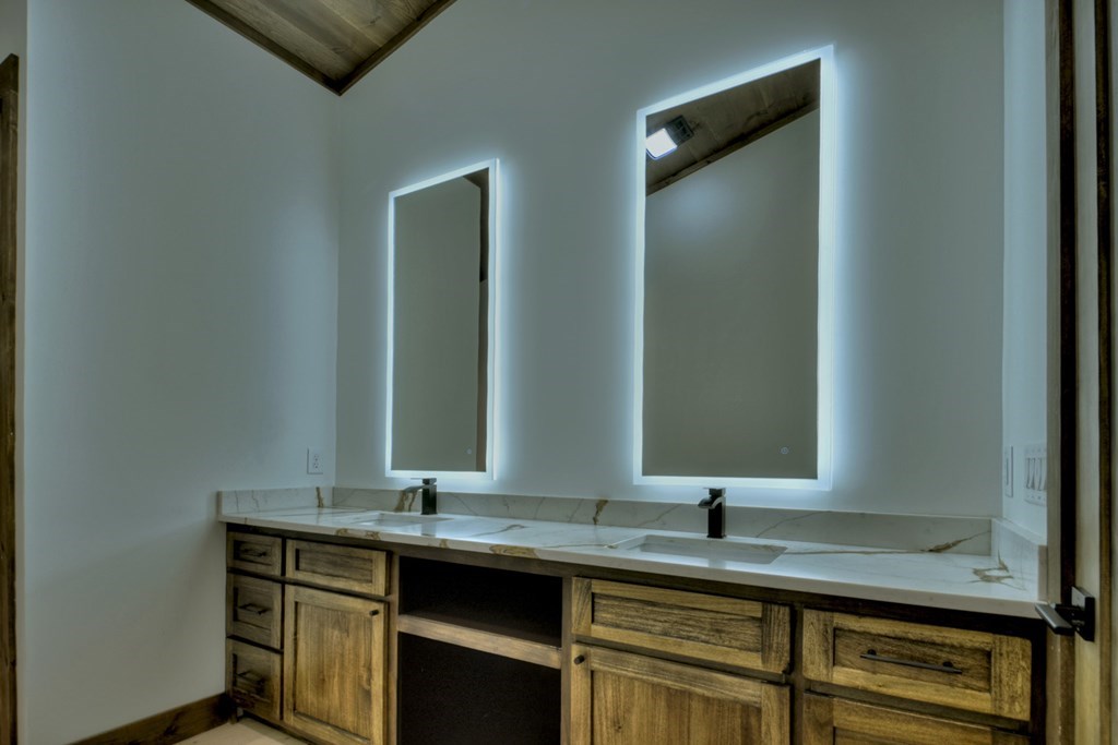 2596 Hwy 2 Blue Ridge Blue Ridge, GA 30513 - Photo 18 of 56 a bathroom with a sink and a mirror