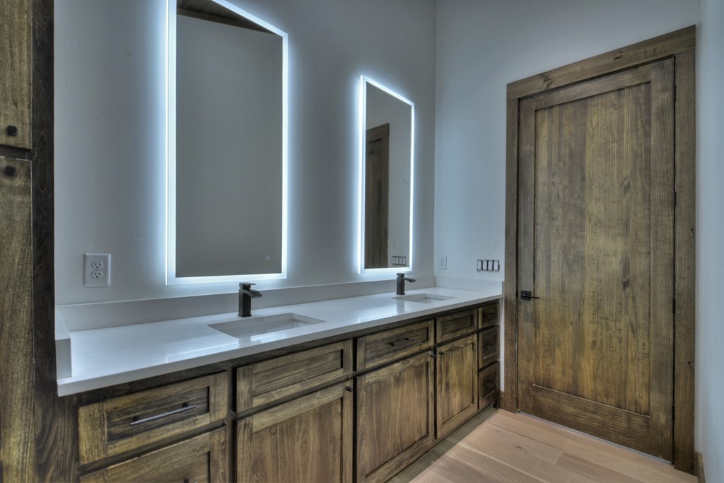 2596 Hwy 2 Blue Ridge Blue Ridge, GA 30513 - Photo 25 of 56 a bathroom with a sink and a mirror