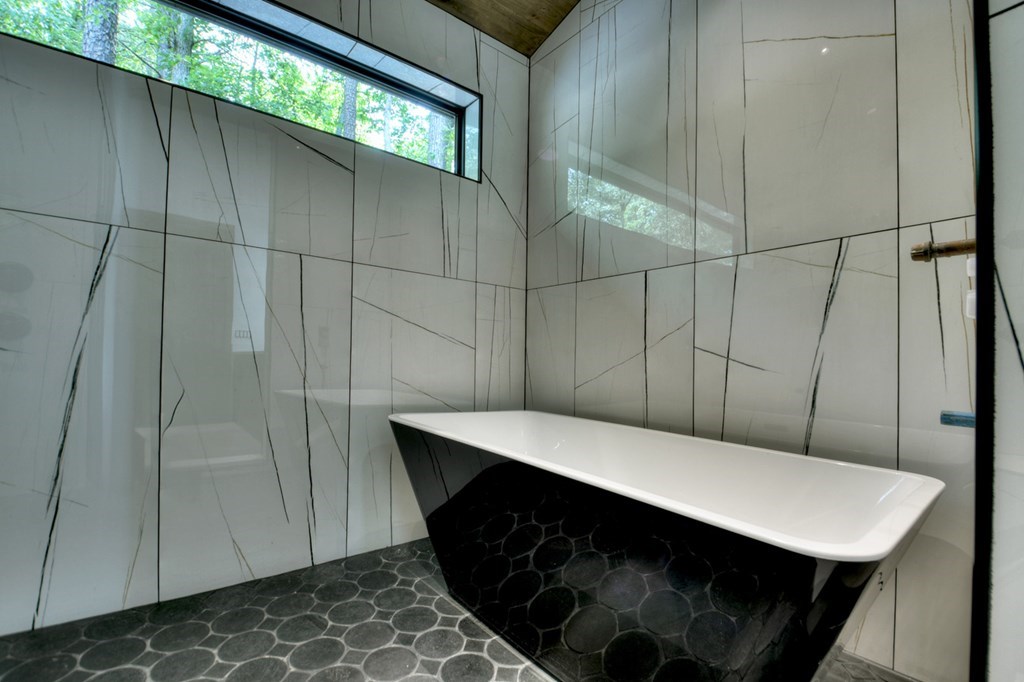 2596 Hwy 2 Blue Ridge Blue Ridge, GA 30513 - Photo 27 of 56 a bathroom with a sink and a mirror