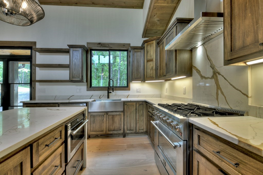 2596 Hwy 2 Blue Ridge Blue Ridge, GA 30513 - Photo 10 of 56 a kitchen with a stove and a sink