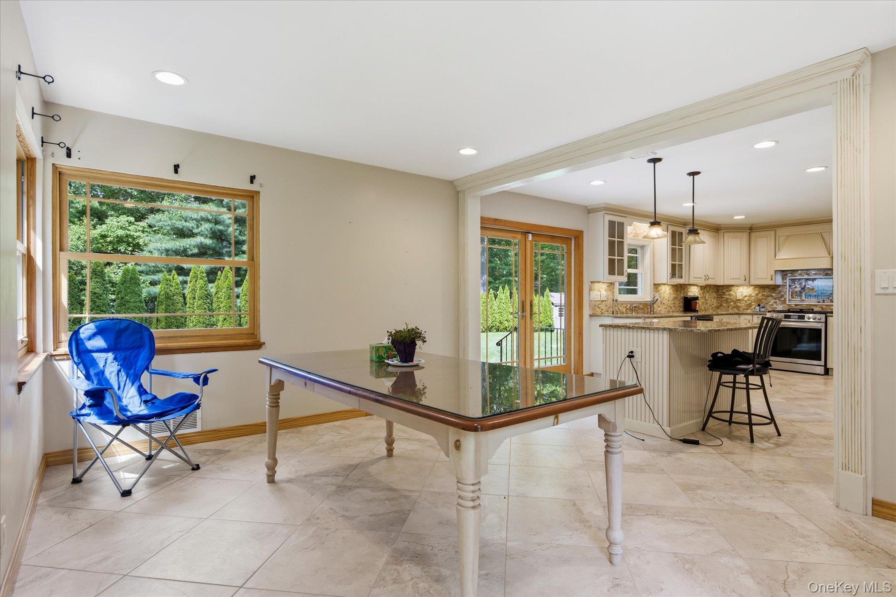 42 Cliff Road Port Jefferson, NY 11777 - Photo 7 of 22 a living room with furniture and a large window