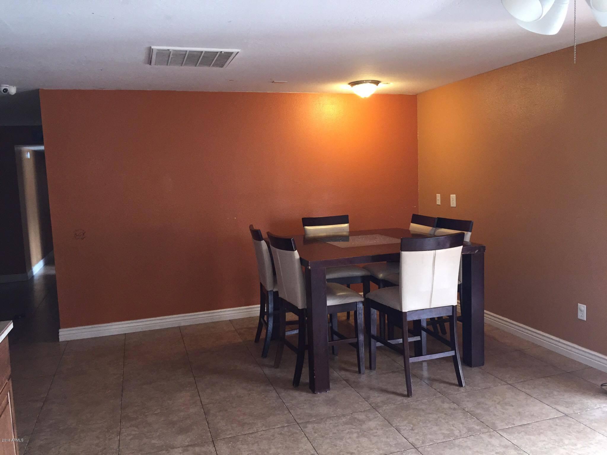 5952 West Berkeley Road Phoenix, AZ 85035 - Photo 7 of 19 a view of a workspace with furniture