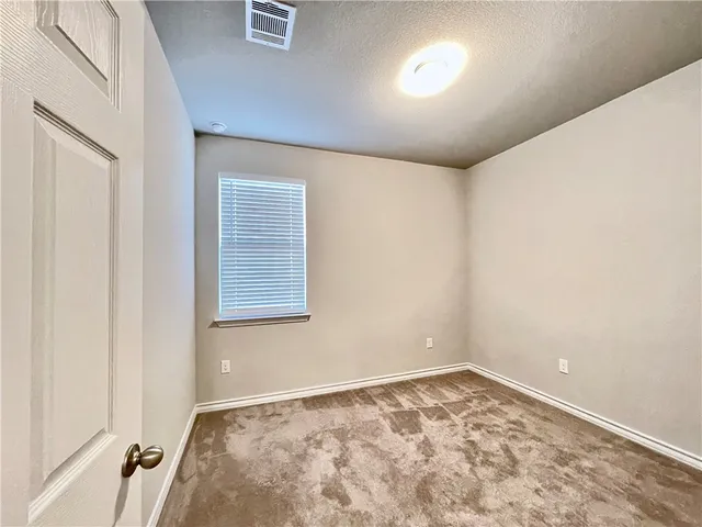 an empty room with a workbench
