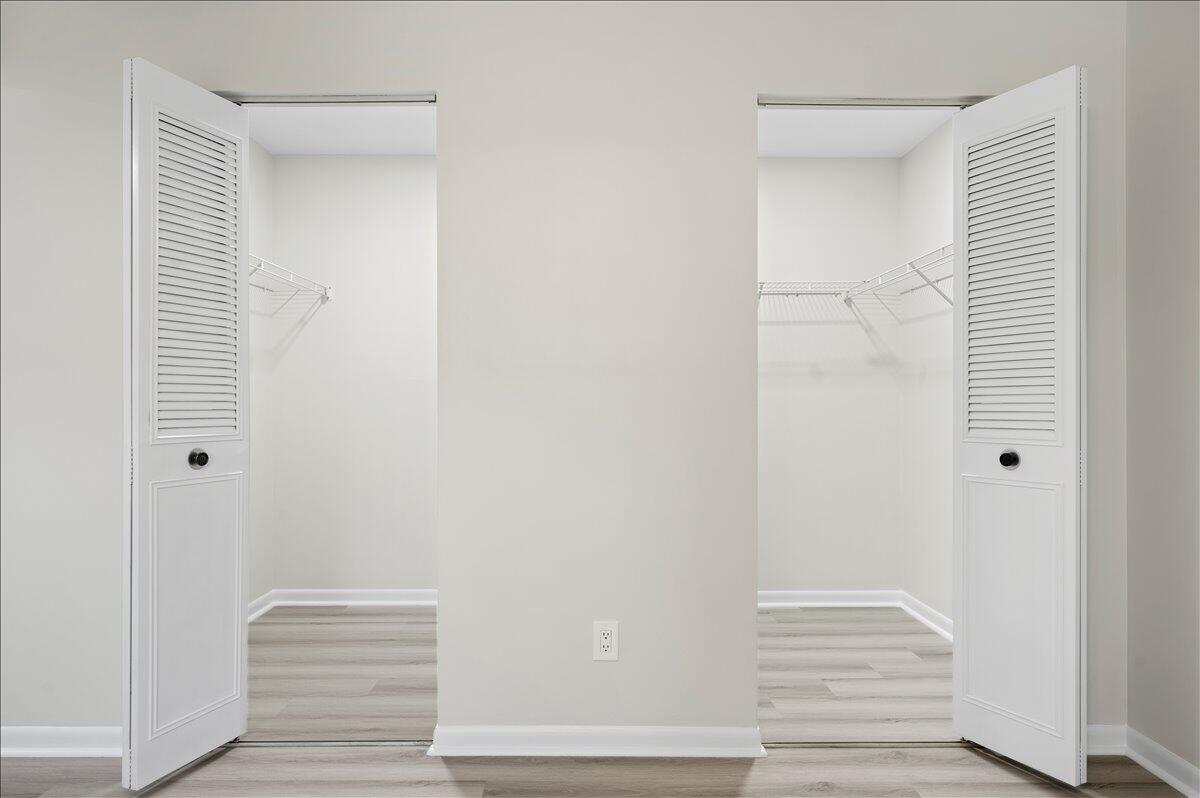 196 Raintree Trail Jupiter, FL 33458 - Photo 22 of 26 a view of front door with wooden floor