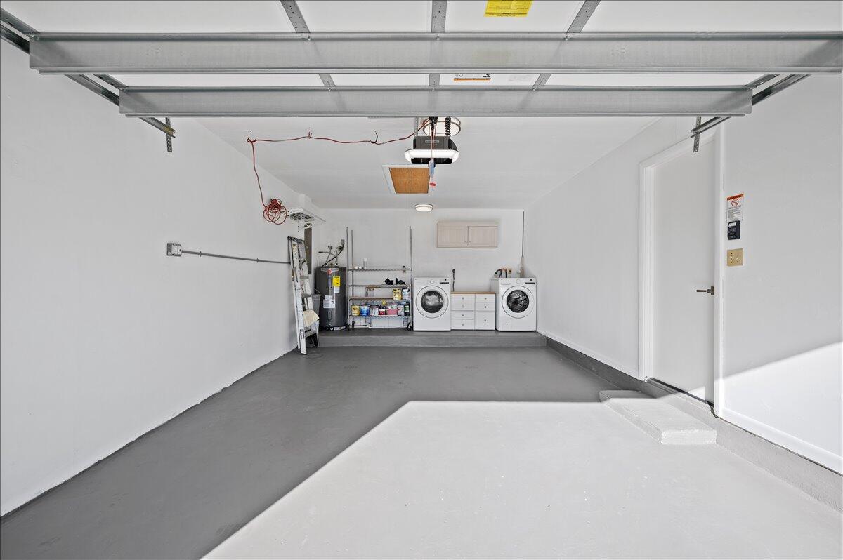 196 Raintree Trail Jupiter, FL 33458 - Photo 23 of 26 a view of storage and utility room