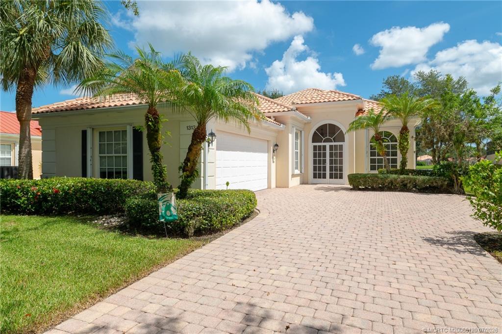 1313 Southwest Balmoral Trace Stuart, FL 34997 - Photo 48 of 70 Recently power washed paver driveway
