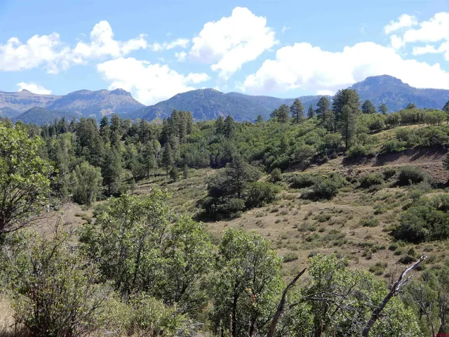 a view of a houses with a yard