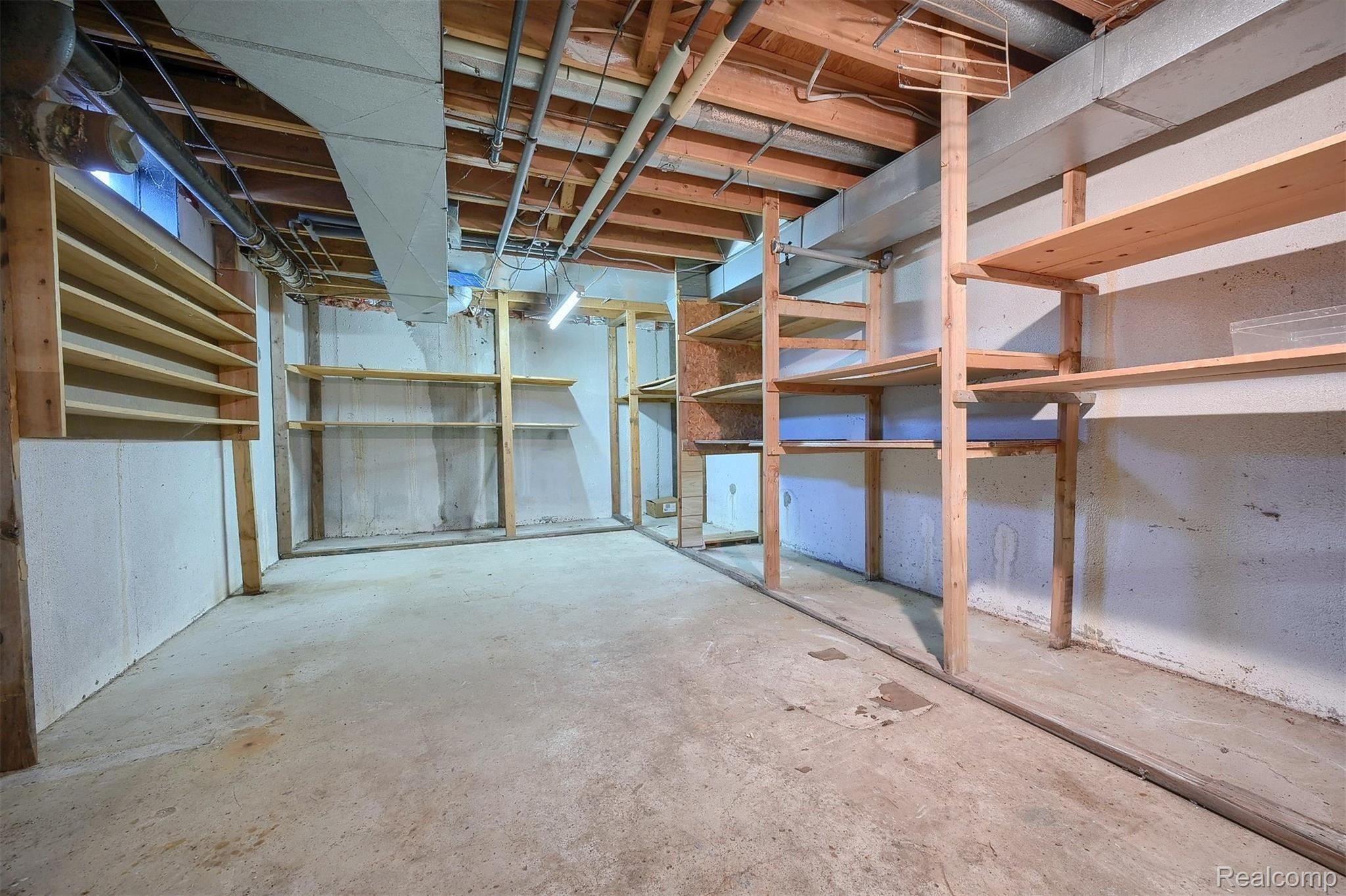 54400 9 Mile Road South Lyon, MI 48178 - Photo 32 of 37 32-Lower-Level-2nd-View.jpg