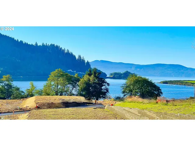 a view of a swimming pool with an outdoor space and seating area