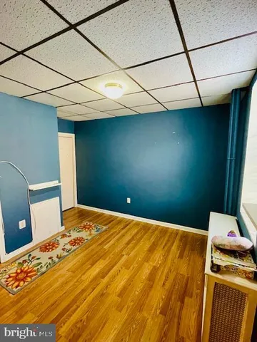 a bedroom with a bed and a table