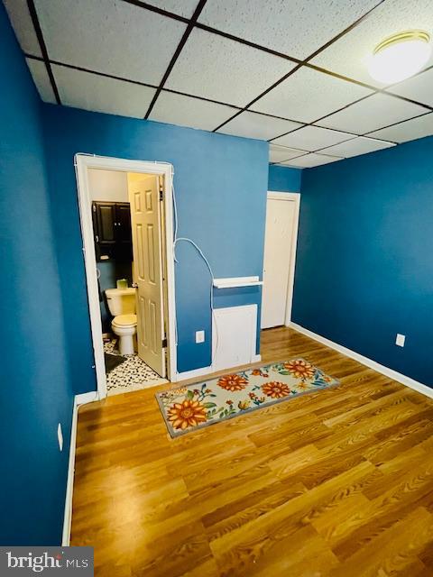 1117 McKean Street, Unit A Philadelphia, PA 19148 - Photo 9 of 14 a bedroom with a bed and a table