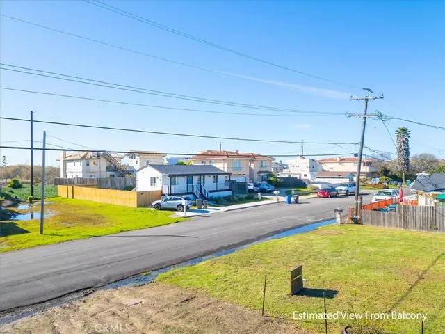 a swimming pool with outdoor seating and yard