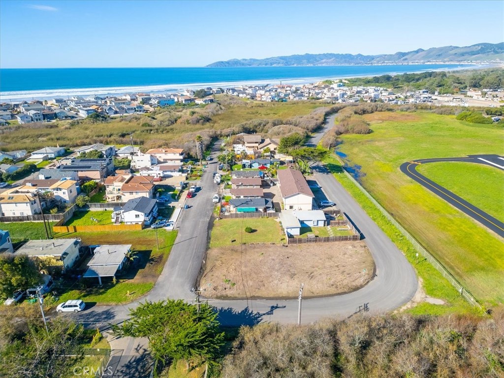1638 Aloha Place Oceano, CA 93445 - Photo 6 of 17 an aerial view of residential houses with outdoor space and ocean view