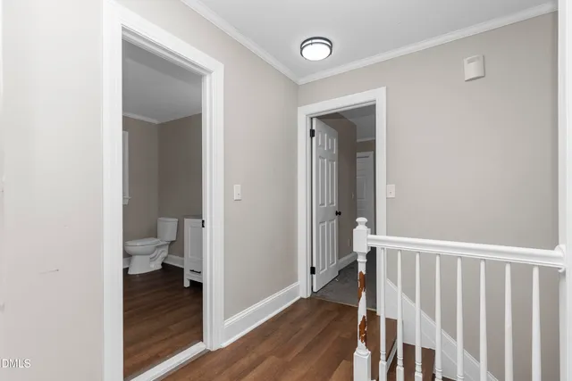 a view of a bathroom from the hallway