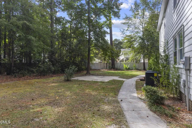 a view of a yard with a trees