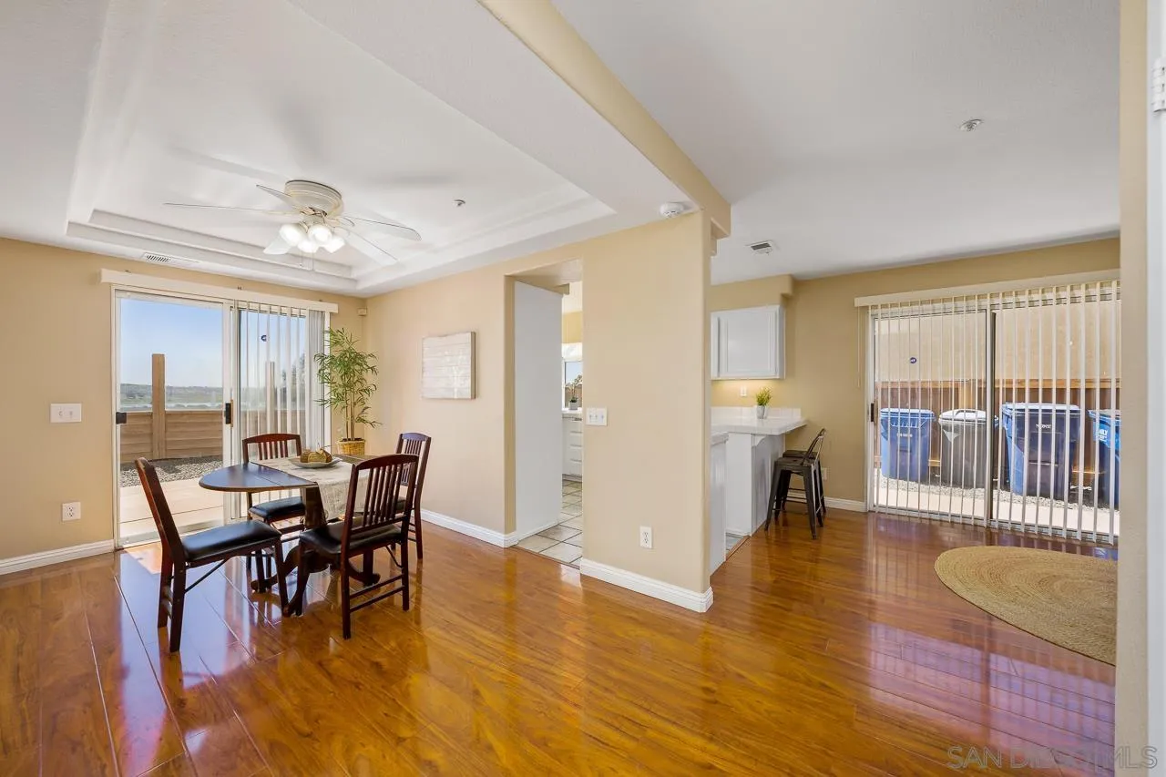 9765 Avenida Ricardo Spring Valley, CA 91977 - Photo 5 of 41 a view of a dining room with furniture and wooden floor