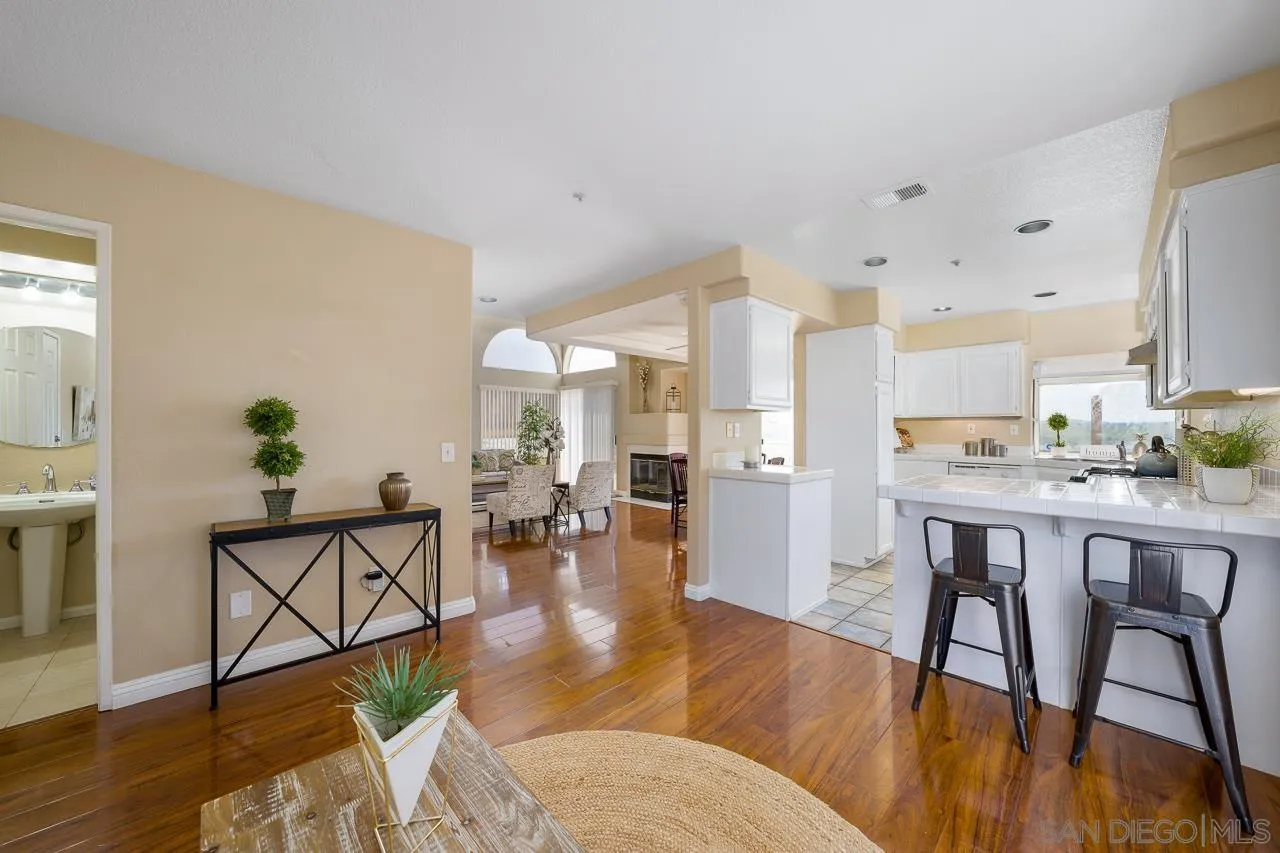 9765 Avenida Ricardo Spring Valley, CA 91977 - Photo 10 of 41 a living room with furniture and wooden floor
