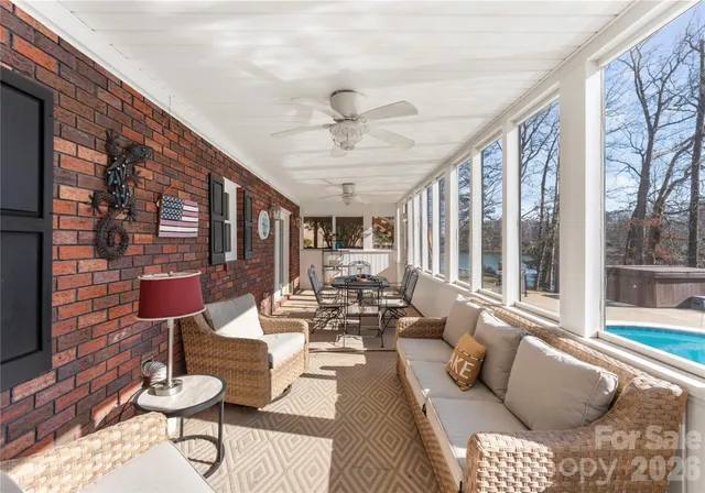 a backyard of a house with outdoor seating