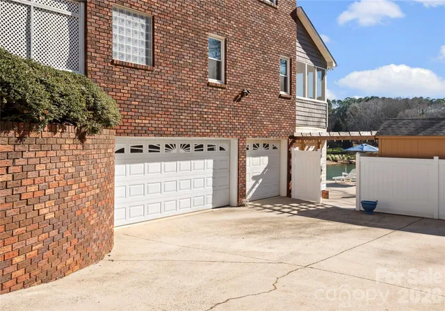 a aerial view of a house with swimming pool