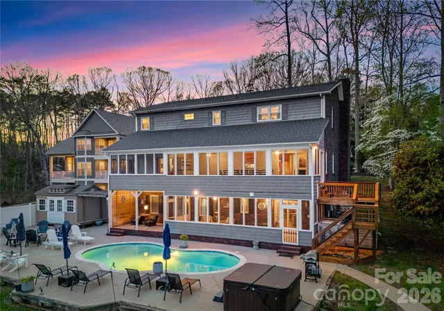 a view of a city with lush green forest