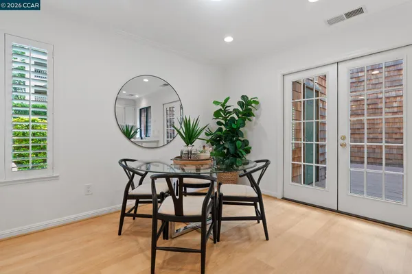 a spacious bedroom with a bed and a window
