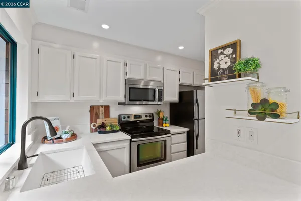 a bathroom with a shower and a sink