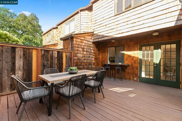 a living room with furniture potted plant and a fireplace