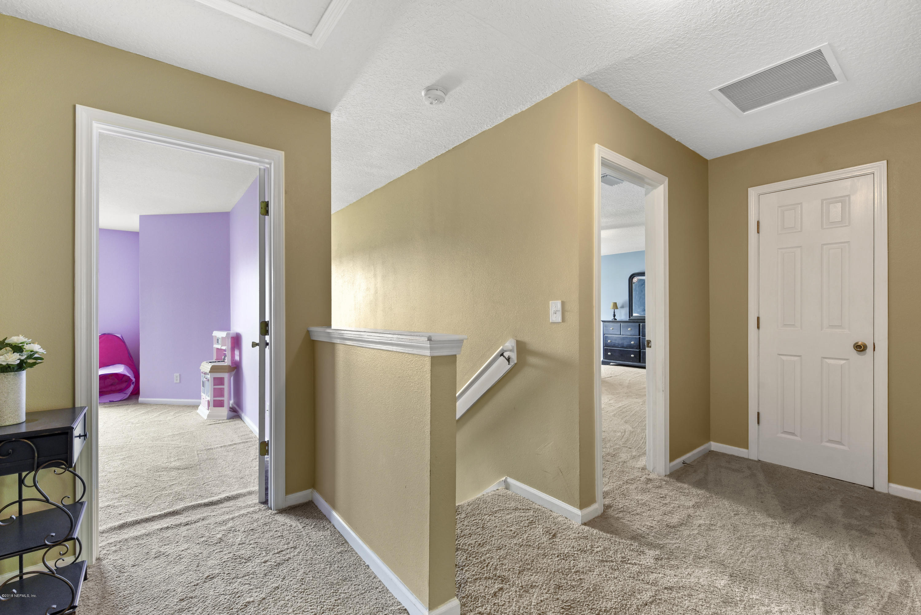 7254 Rampart Ridge Circle South Jacksonville, FL 32244 - Photo 13 of 28 a view of a hallway view with staircase