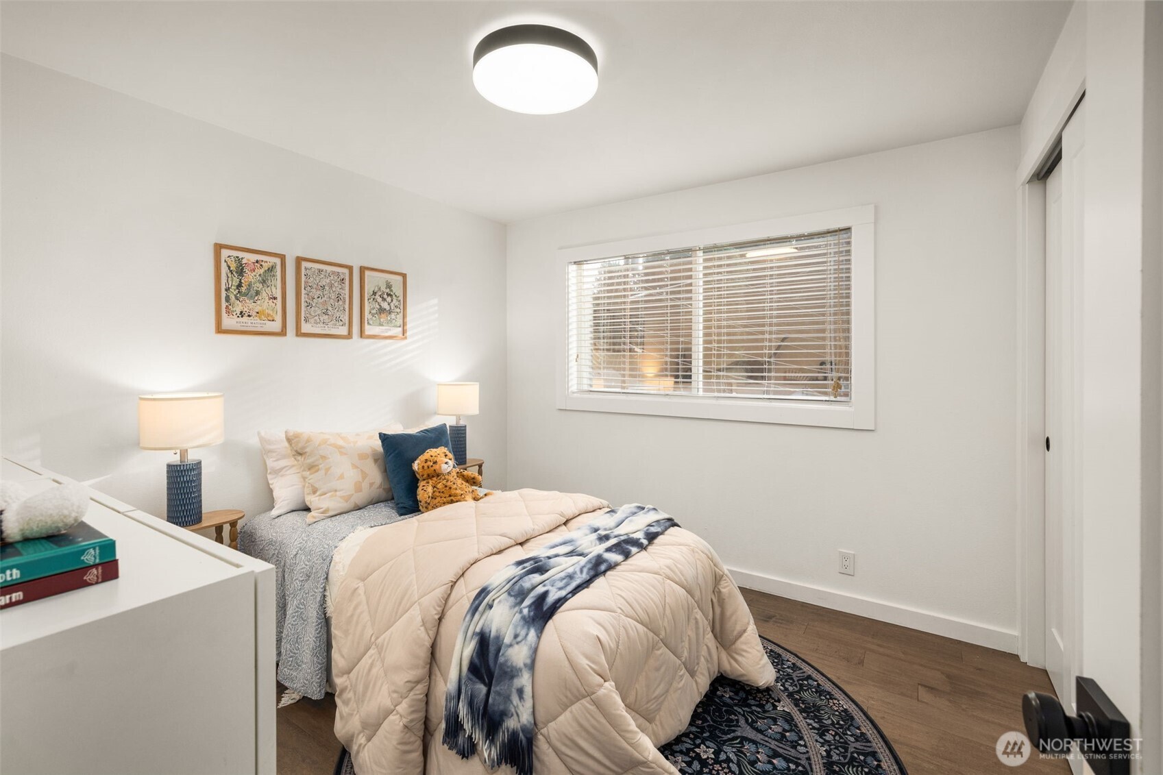 9417 235th Place Southwest Edmonds, WA 98020 - Photo 16 of 30 a bedroom with a bed and a window