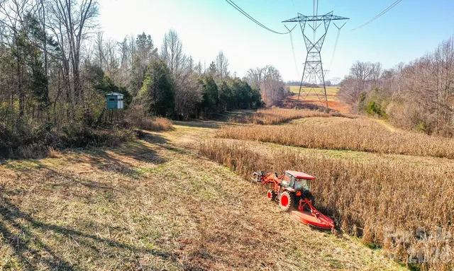 a view of swimming pool with a yard