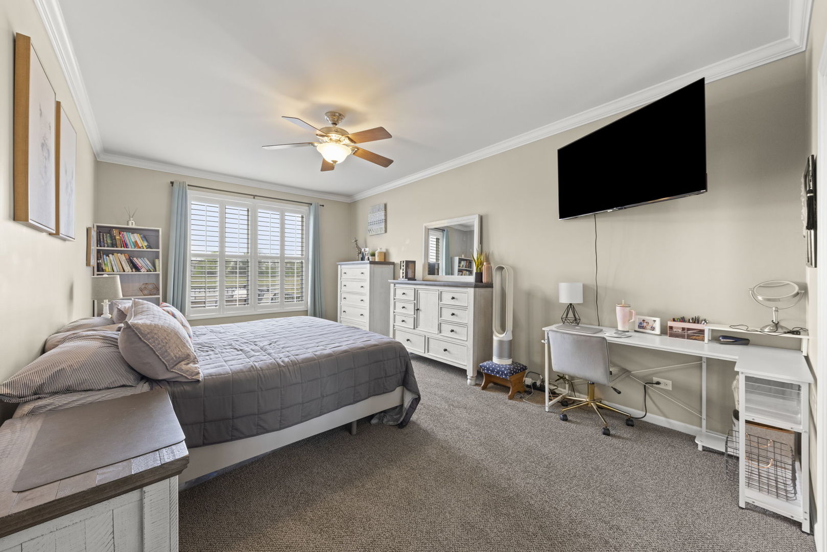 11625 Heritage Meadows Drive Plainfield, IL 60585 - Photo 15 of 40 a bed room with a bed and a television