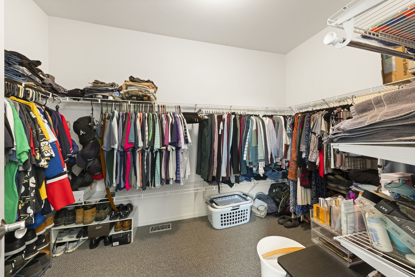 11625 Heritage Meadows Drive Plainfield, IL 60585 - Photo 19 of 40 a view of walk in closet with clothes