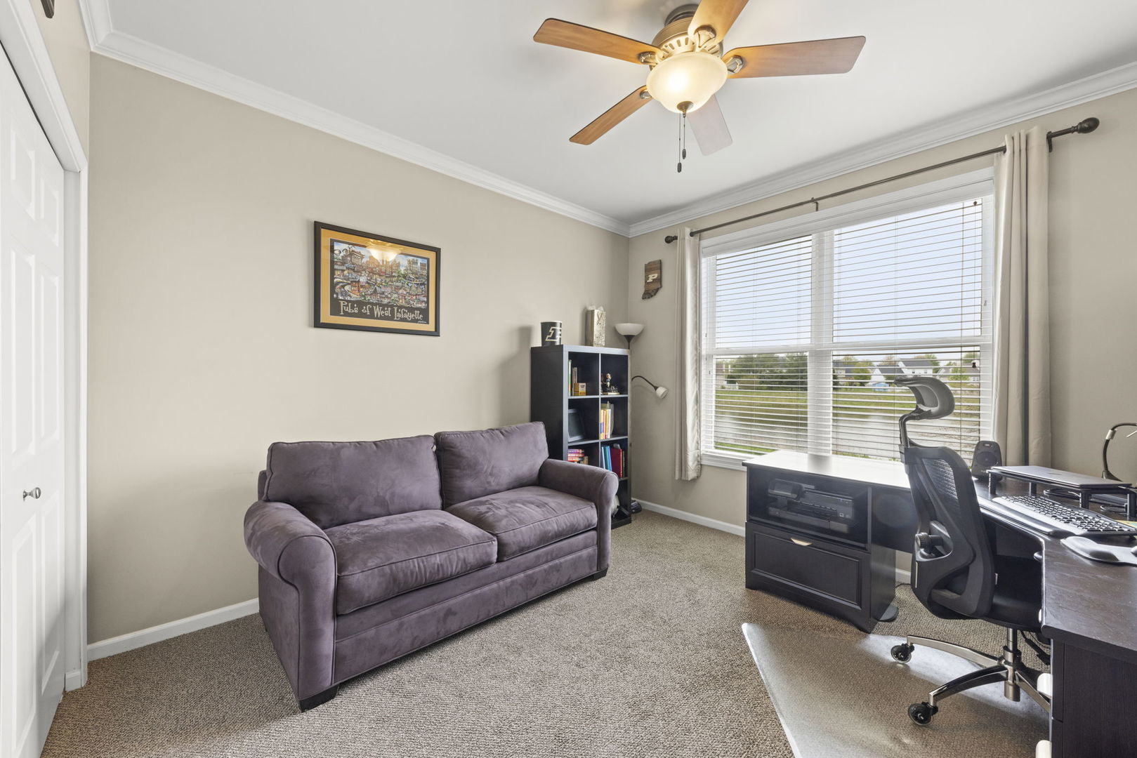 11625 Heritage Meadows Drive Plainfield, IL 60585 - Photo 21 of 40 a living room with furniture and a window