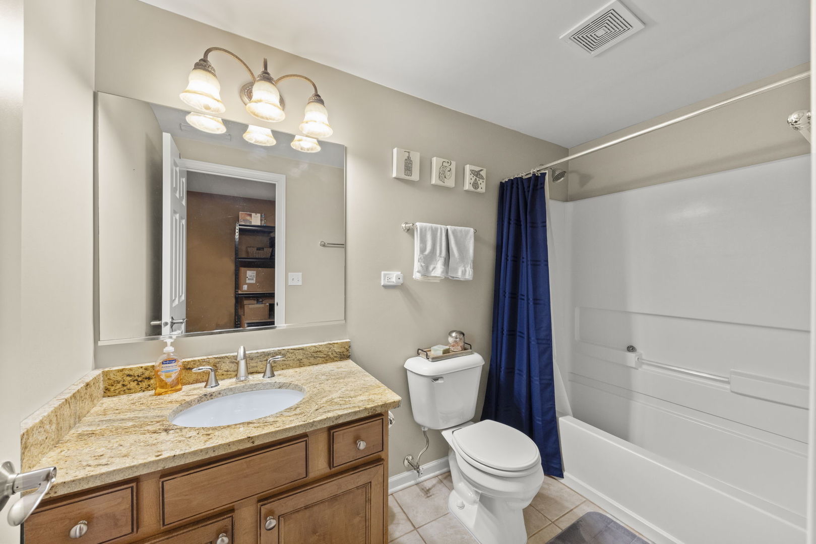 11625 Heritage Meadows Drive Plainfield, IL 60585 - Photo 27 of 40 a bathroom with a granite countertop sink toilet and shower