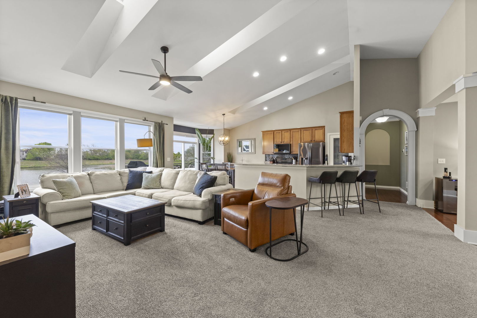 11625 Heritage Meadows Drive Plainfield, IL 60585 - Photo 8 of 40 a living room with fireplace furniture and a large window