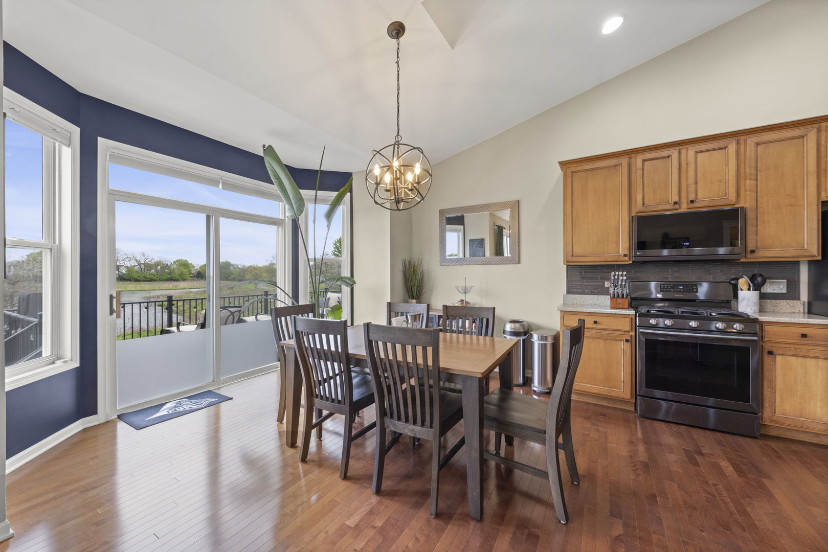 11625 Heritage Meadows Drive Plainfield, IL 60585 - Photo 10 of 40 a view of a dining room with furniture window and wooden floor