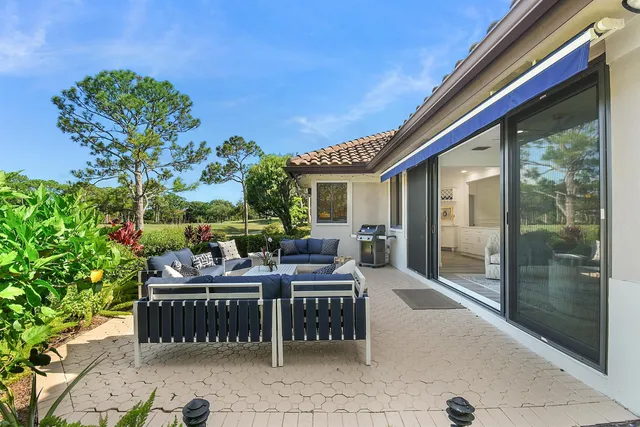a bathroom with a shower a toilet and a sink