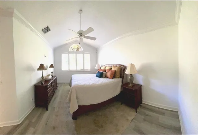 a bathroom with a double vanity sink toilet and mirror