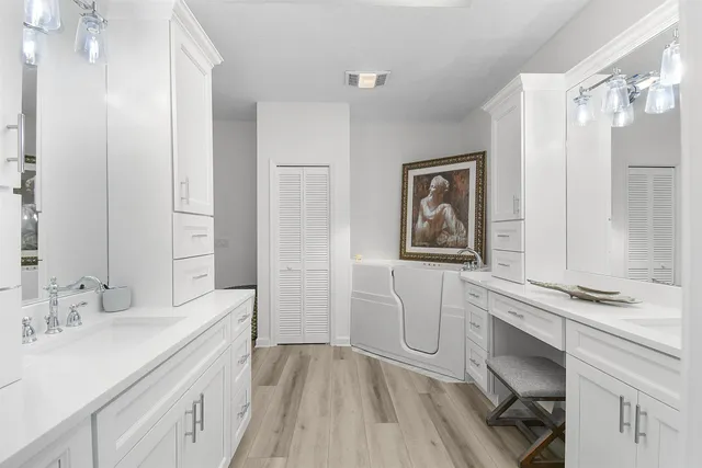 a bathroom with a bathtub and a shower