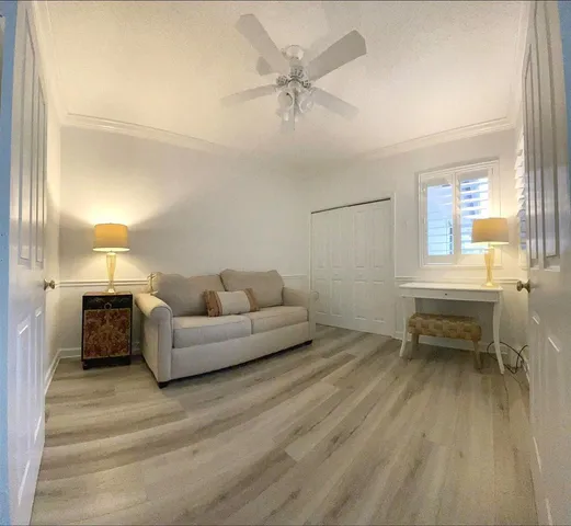 a view of a swimming pool with a lounge chair