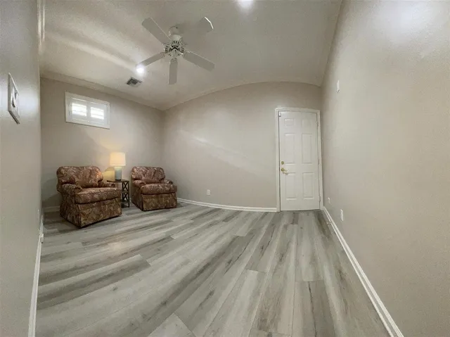 an aerial view of residential houses with outdoor space and swimming pool