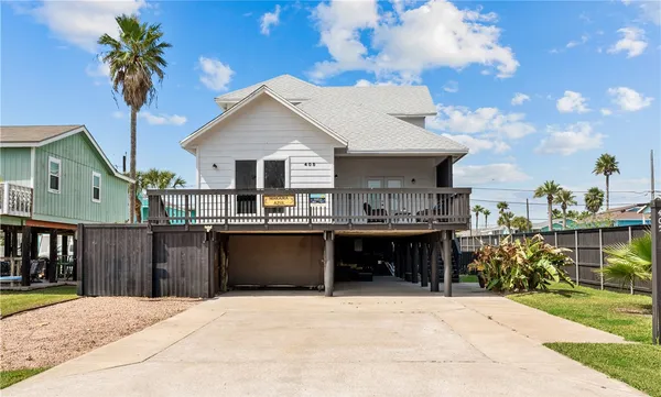 a house view with a garden space
