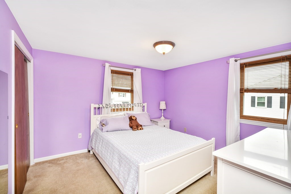15 Old Farm Road Randolph, MA 02368 - Photo 20 of 22 a bedroom with a bed and a window