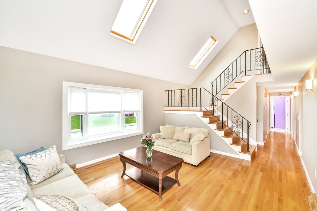 15 Old Farm Road Randolph, MA 02368 - Photo 22 of 22 a living room with furniture and wooden floor