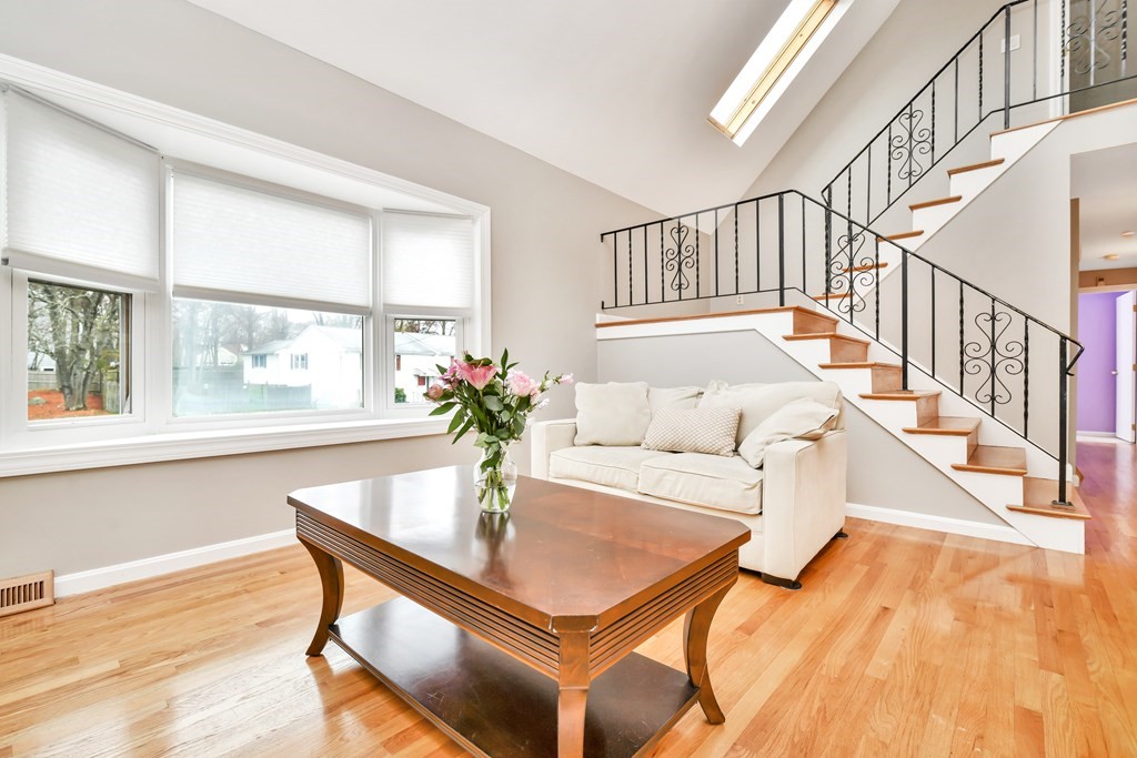 15 Old Farm Road Randolph, MA 02368 - Photo 7 of 22 a living room with furniture and a large window