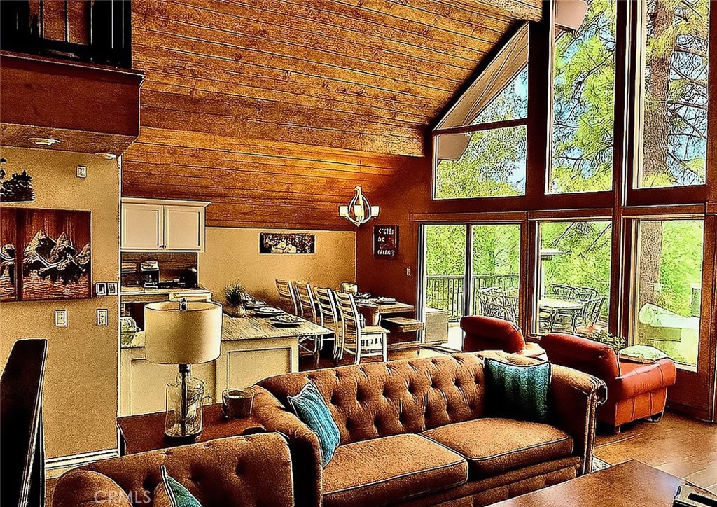 27550 North Bay Road Lake Arrowhead, CA 92352 - Photo 12 of 53 a living room with furniture and a large window