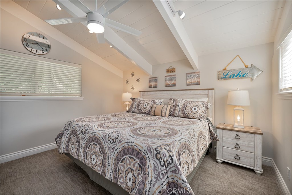 27550 North Bay Road Lake Arrowhead, CA 92352 - Photo 31 of 53 a bedroom with a bed and a window